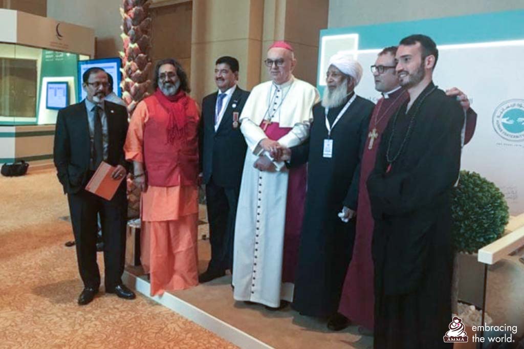 Members of many different religions, including Pope Francis stand together and smile