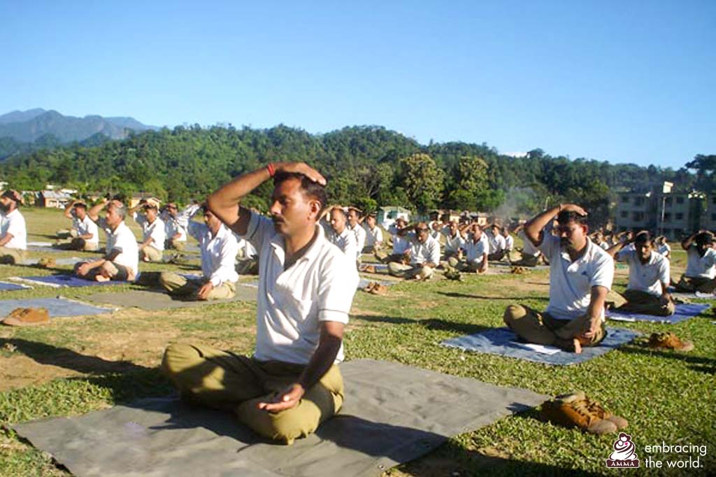 Police practice meditation outside