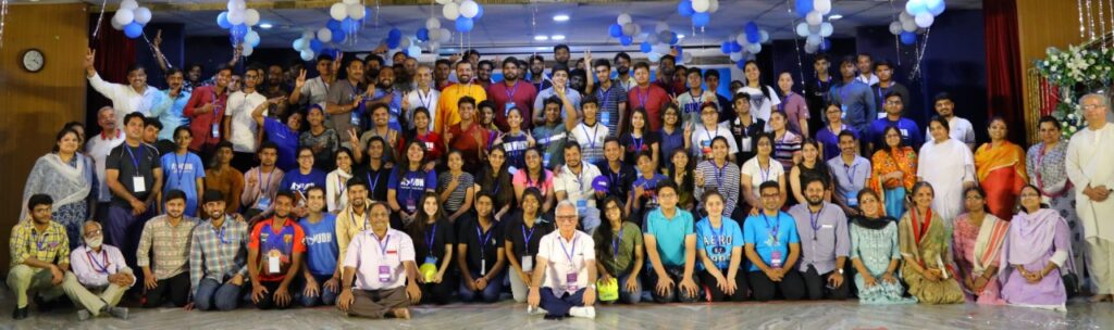 Group photo of youth participants and organizers. 