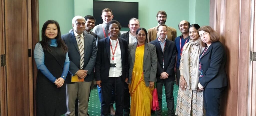 Representatives of Amrita University and King's College, London stand together for a portrait