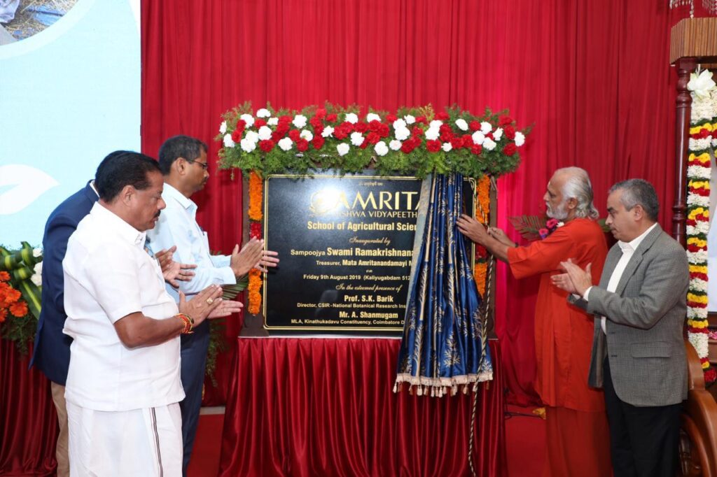 The plaque is revealed by pulling back a curtain