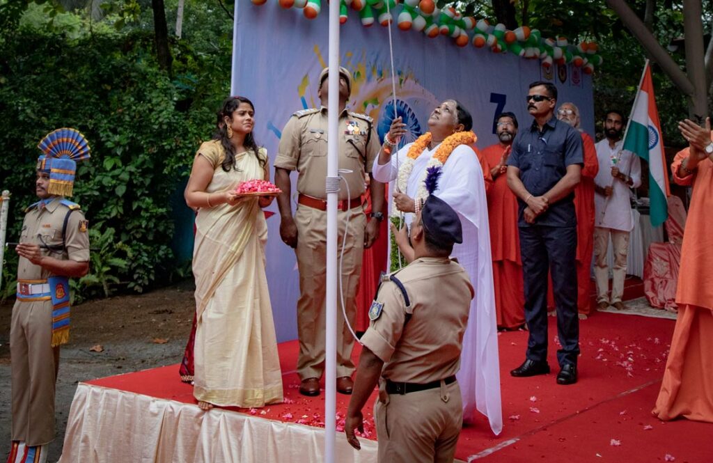 Amma helps hoist the flag