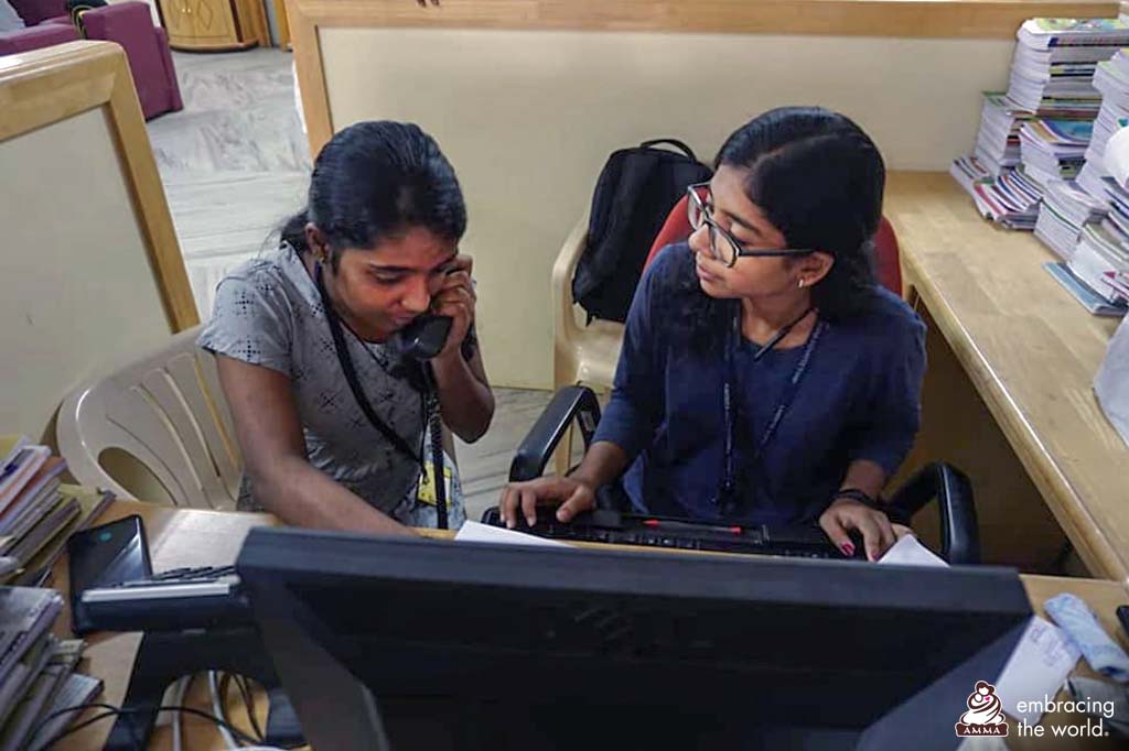 Two students at work on a computer