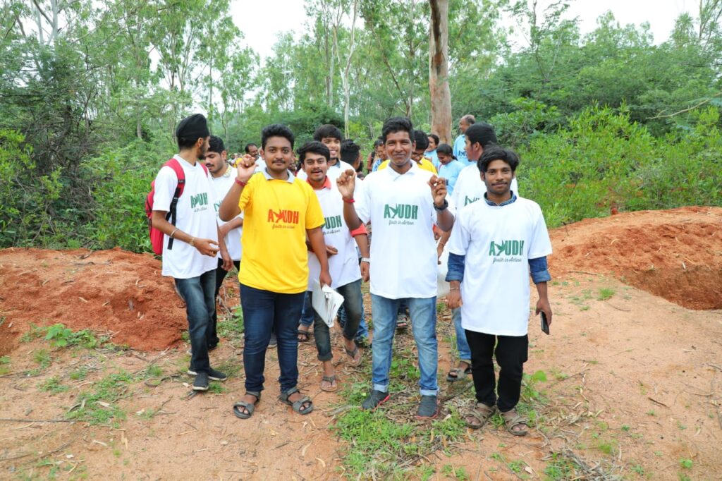 Students walk through the forest