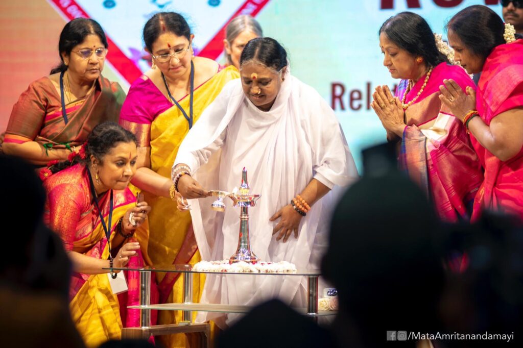 Amma lights a lamp