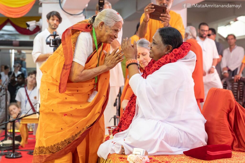 Amma greets special guests