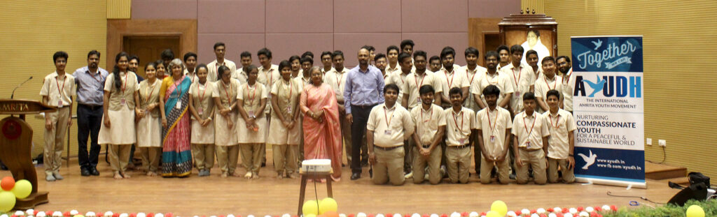 Students and staff gather for photo op