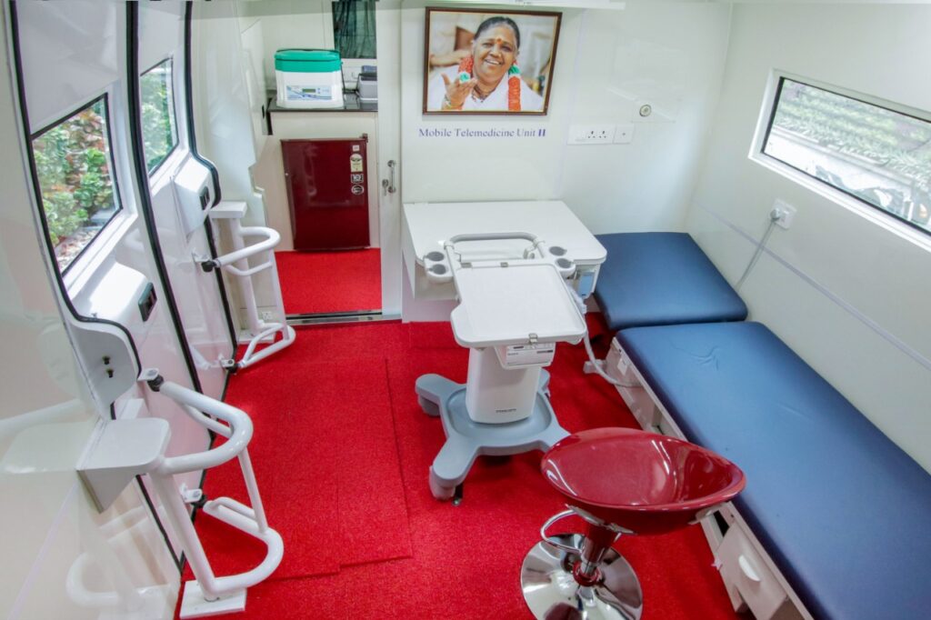 patient bed and doorway inside the telemedicine van