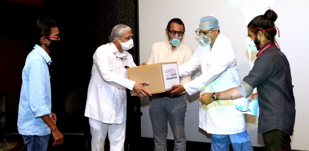 Dr. Prem Nair receives box