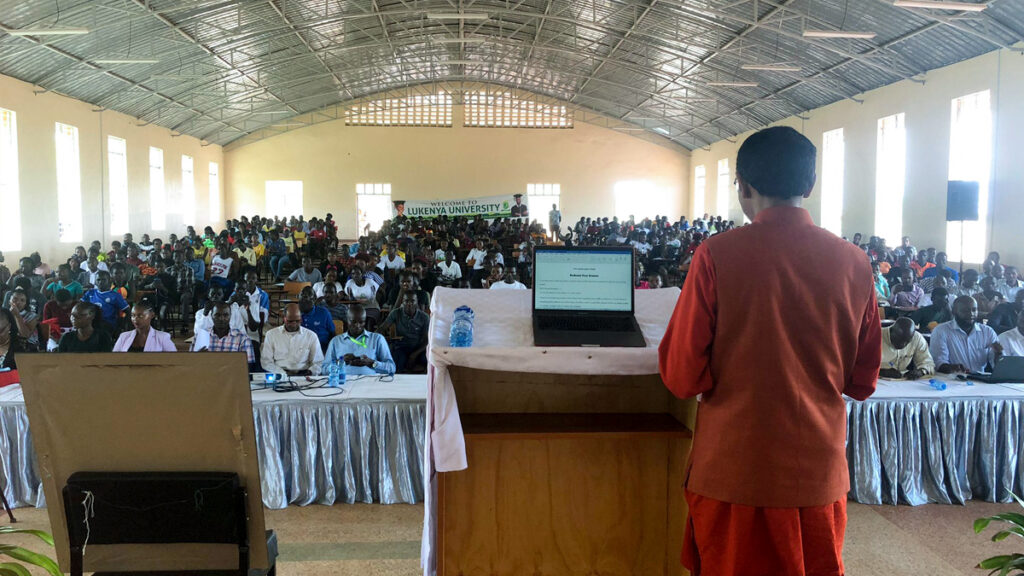 A huge hall is filled with students