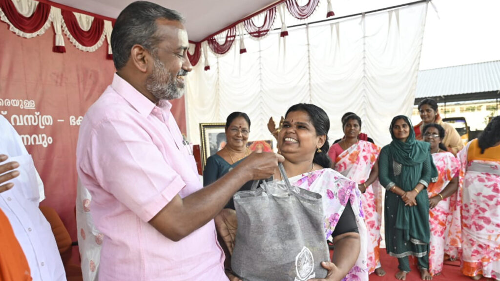 Minister hands over bag of food items