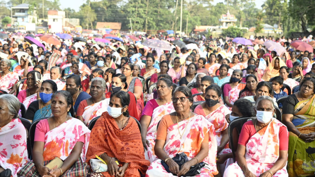 10,000 women sit in outdoor venue