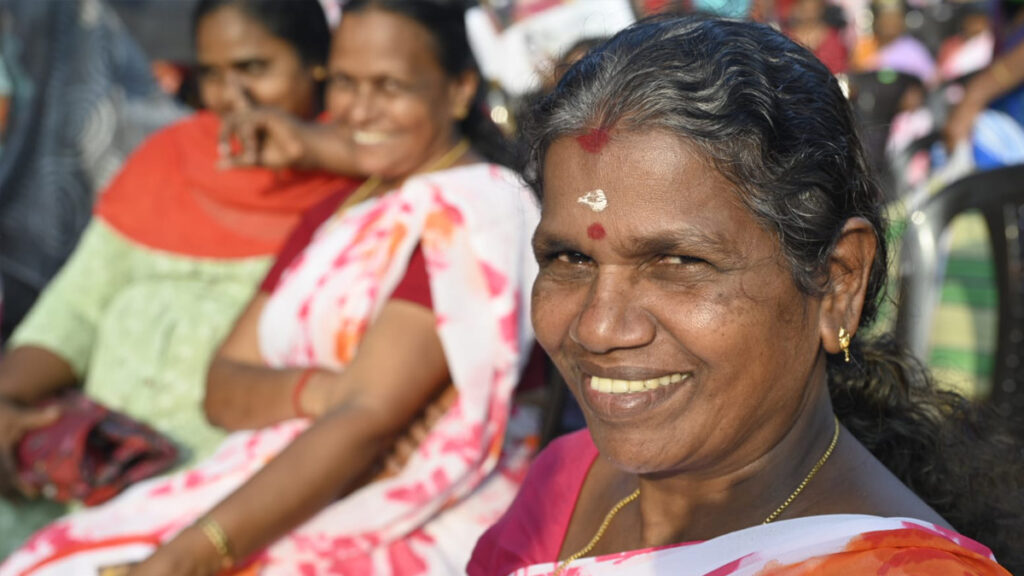 Women smile into camera