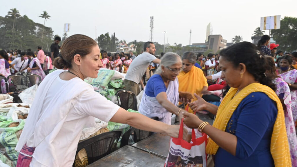 International volunteers pass out goods