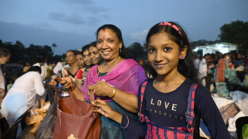 Mother and daughter smile happily