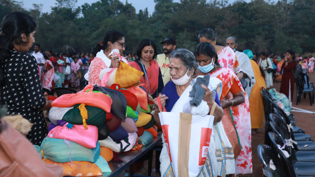 Piles of goods distributed to women