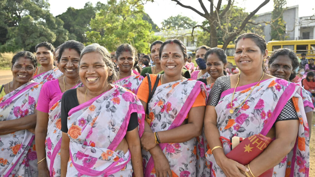 Women laugh together