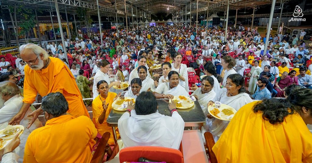 Amma giving meals