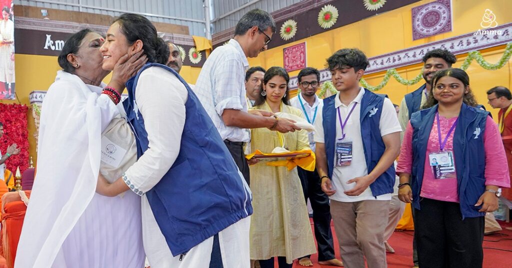Amma blesses youth 