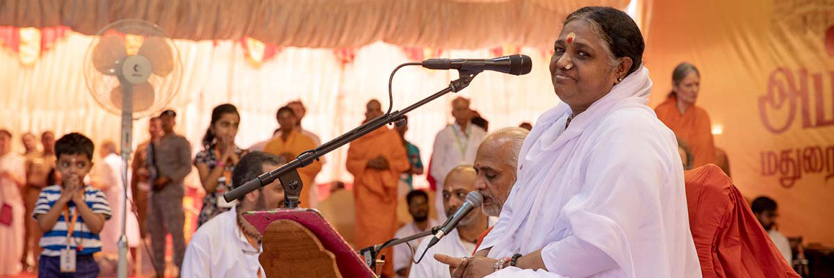 Amma on stage about to sing Bhajans