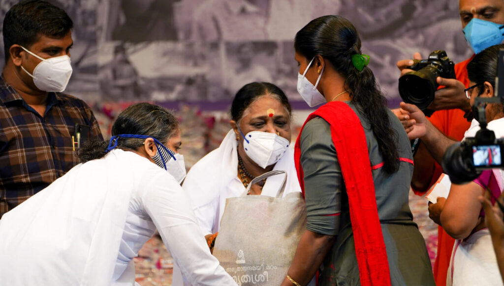 Amma greets SHG members