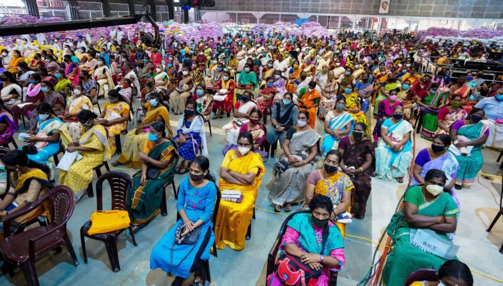 Amritapuri Ashram's main hall is filled with members of SHG members