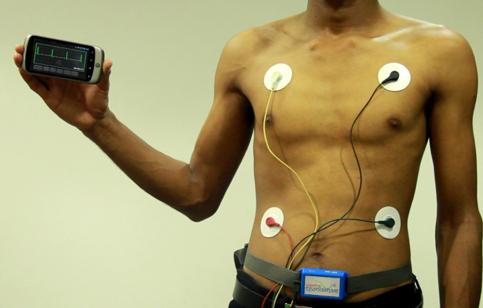 Man wearing device, attached in four places on his torso