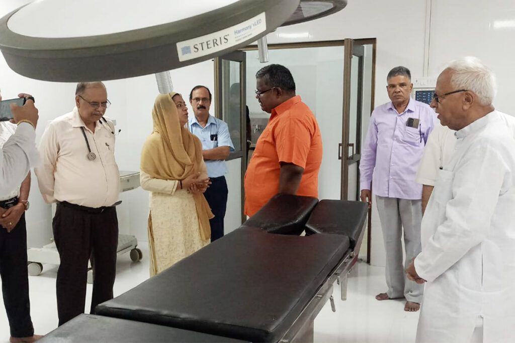 People gathered around an operating table