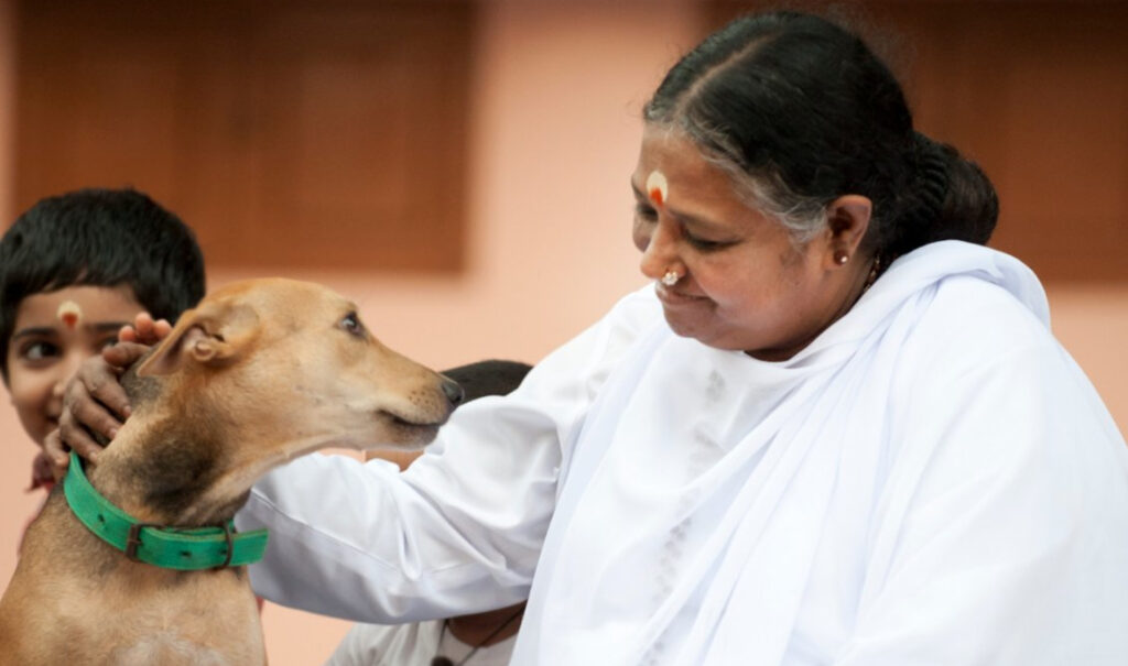 Amma smiles at Bhakti