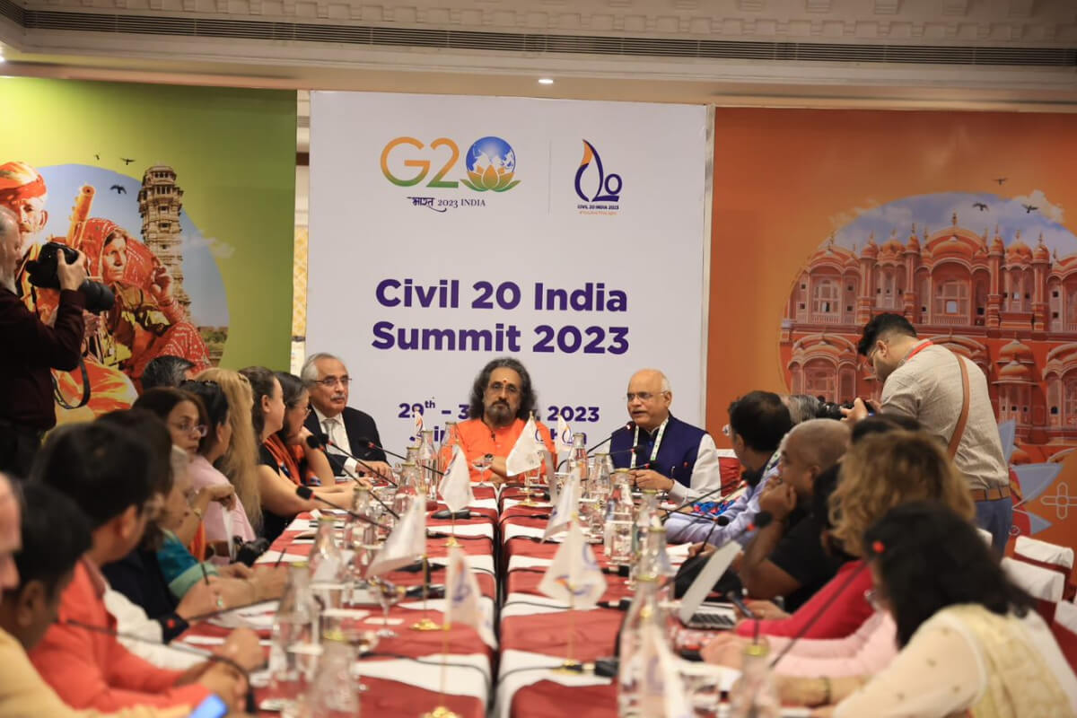 C20 Summit participants seated together engaged in discussion