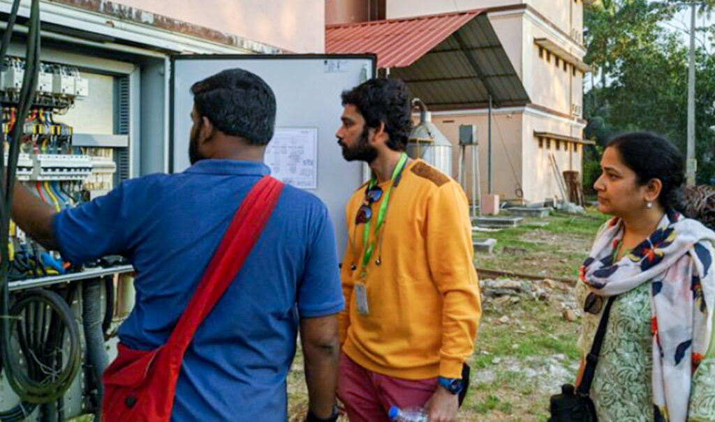 Volunteers look at electrical grids