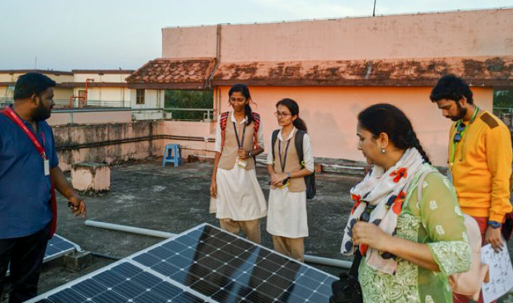 Amrita University students with solar panels