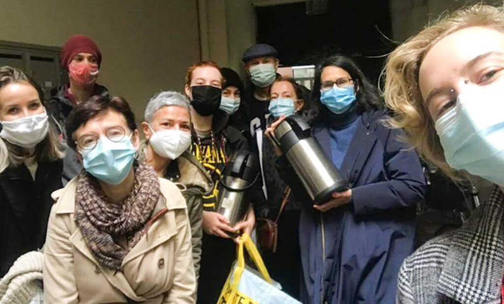 Volunteers wearing masks