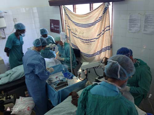 Doctors perform surgery on patients