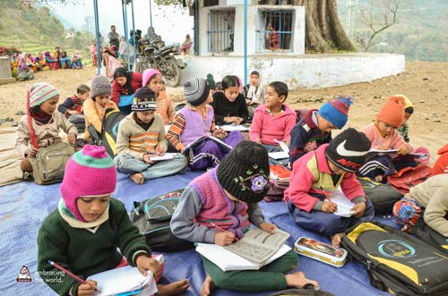 Children study in an outdoor school