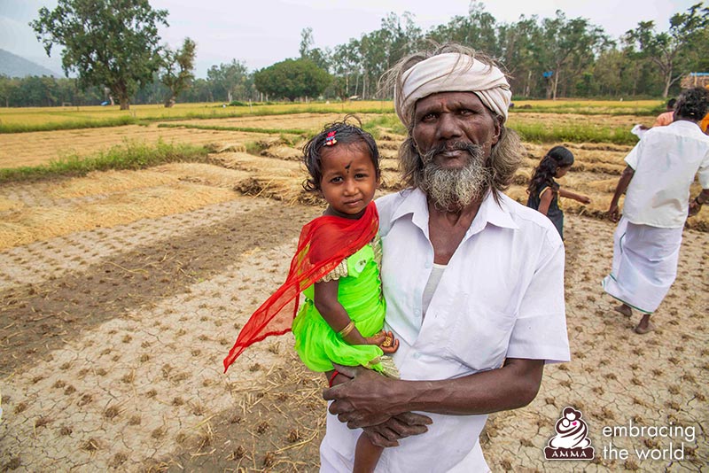 Farmer with his daughter