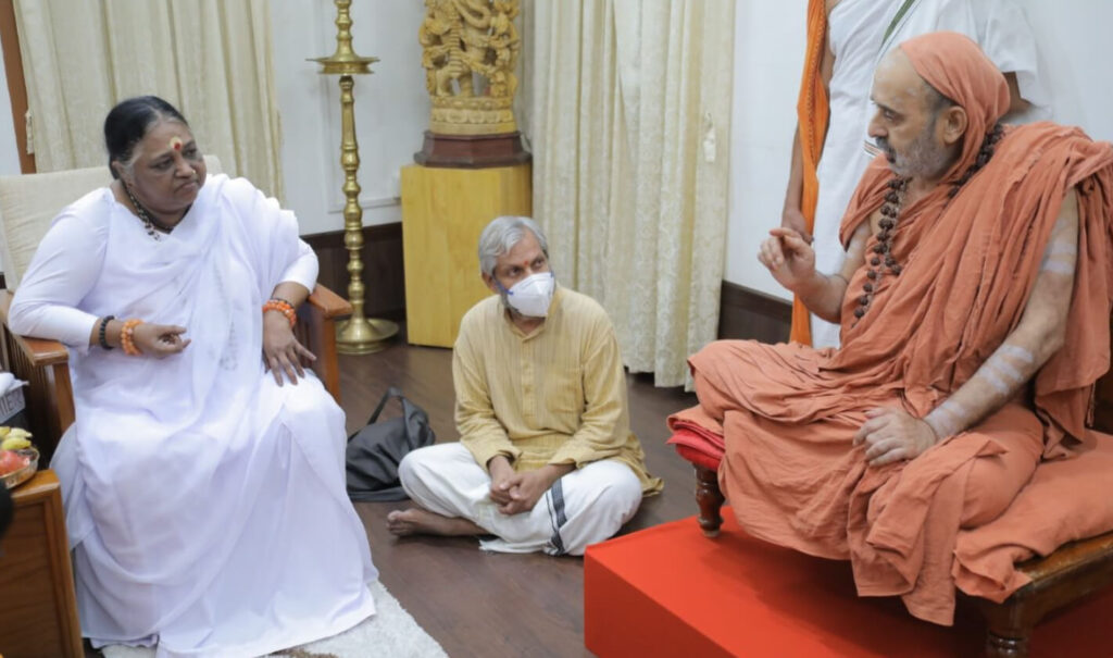 Swami meets with Amma