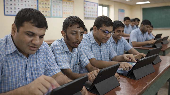 students use tablets to learn