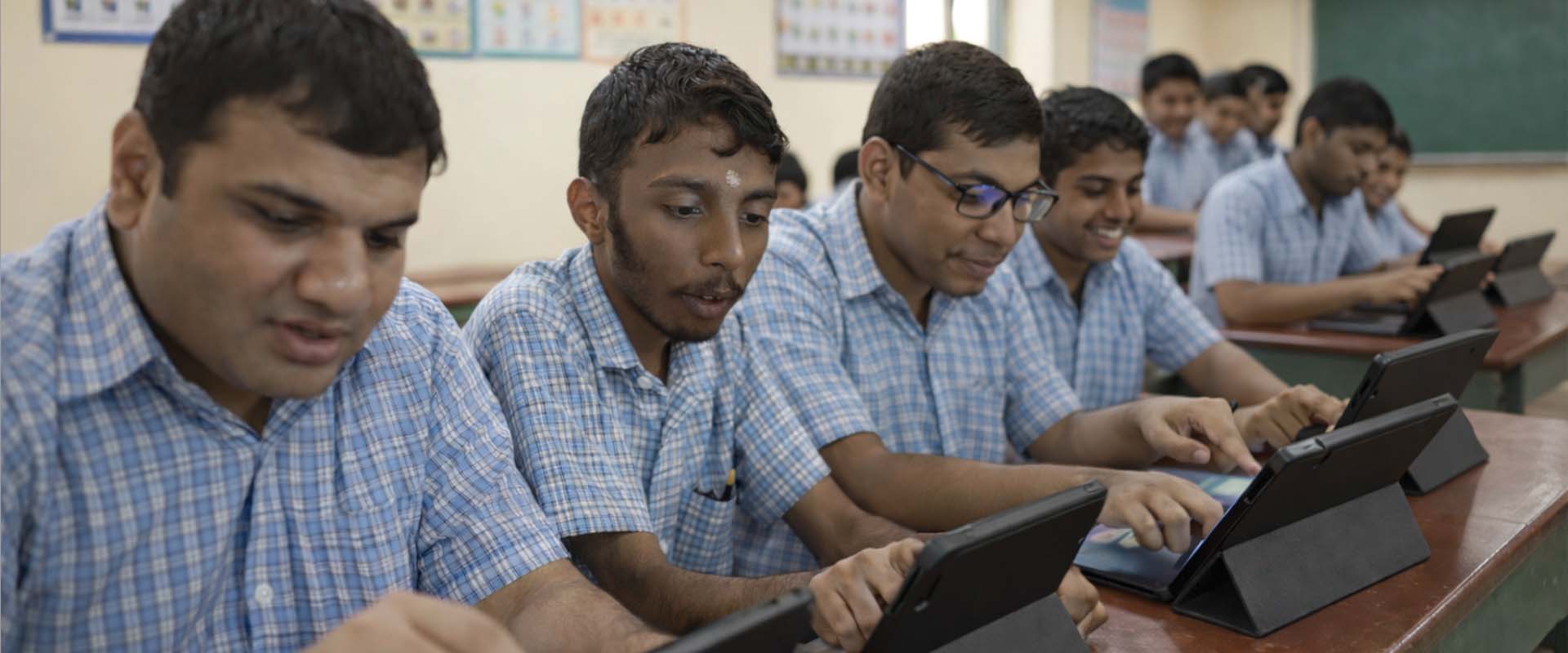 students use tablets to learn