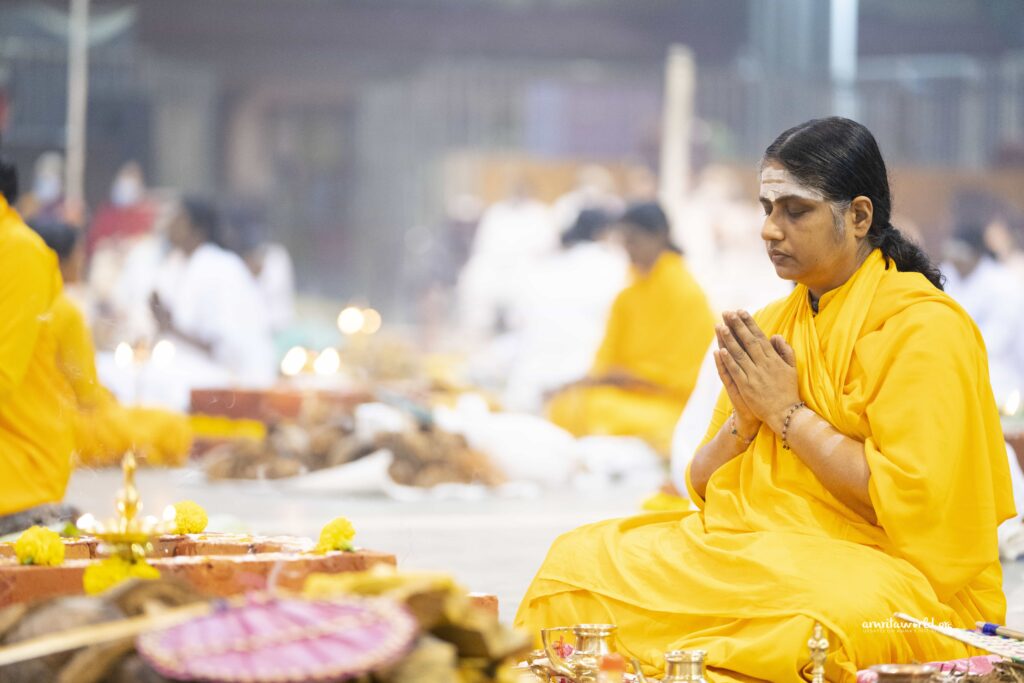 Female priest prays before starting