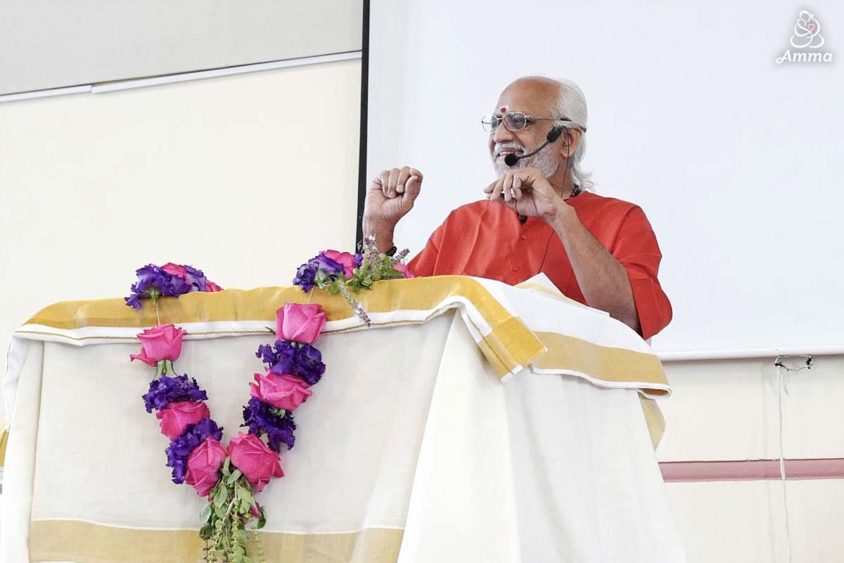 A Swami smiles as he speaks
