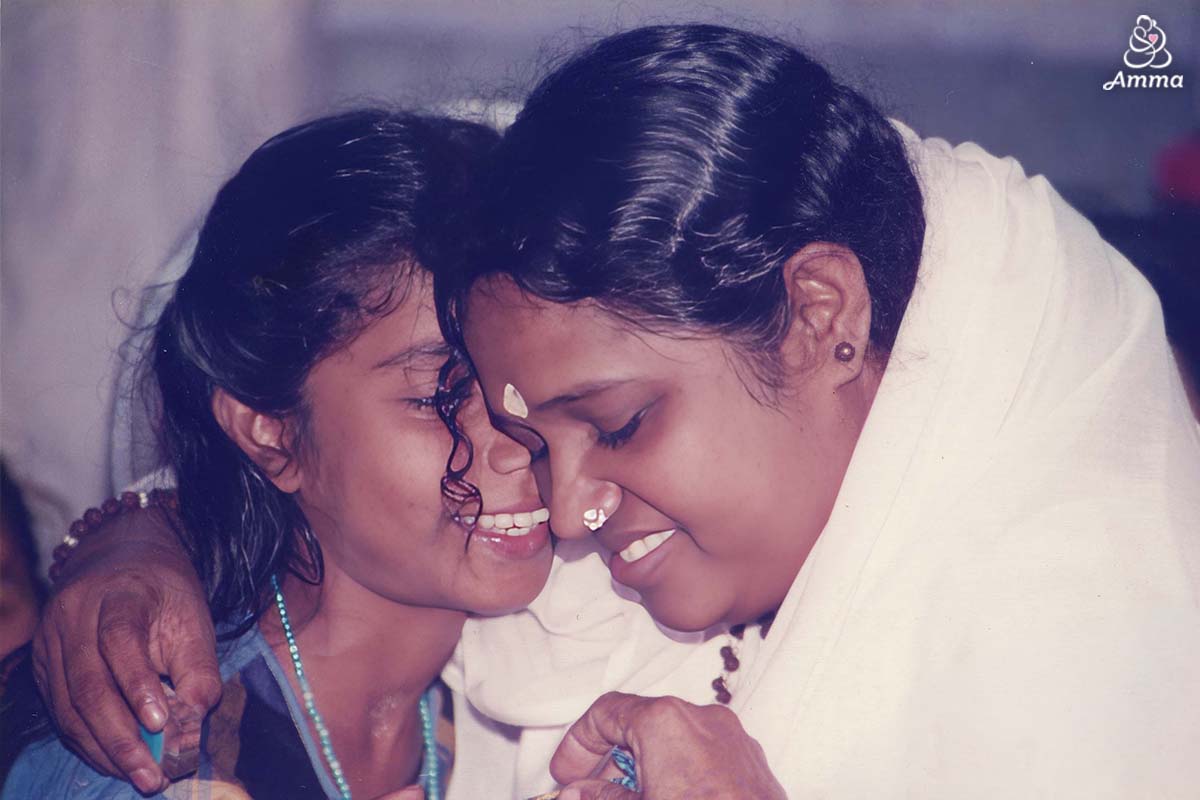 Amma listens to an adolescent girl