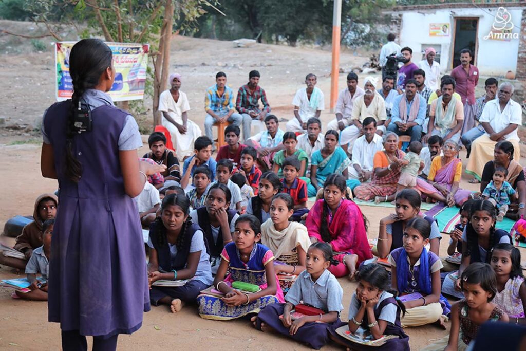 an adolescent village girl addresses a crowd