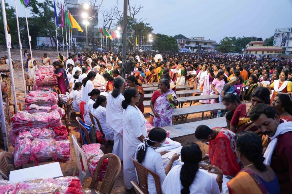 Thousands of women receive aid into the night