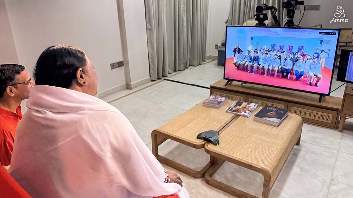 Amma address the students via video call
