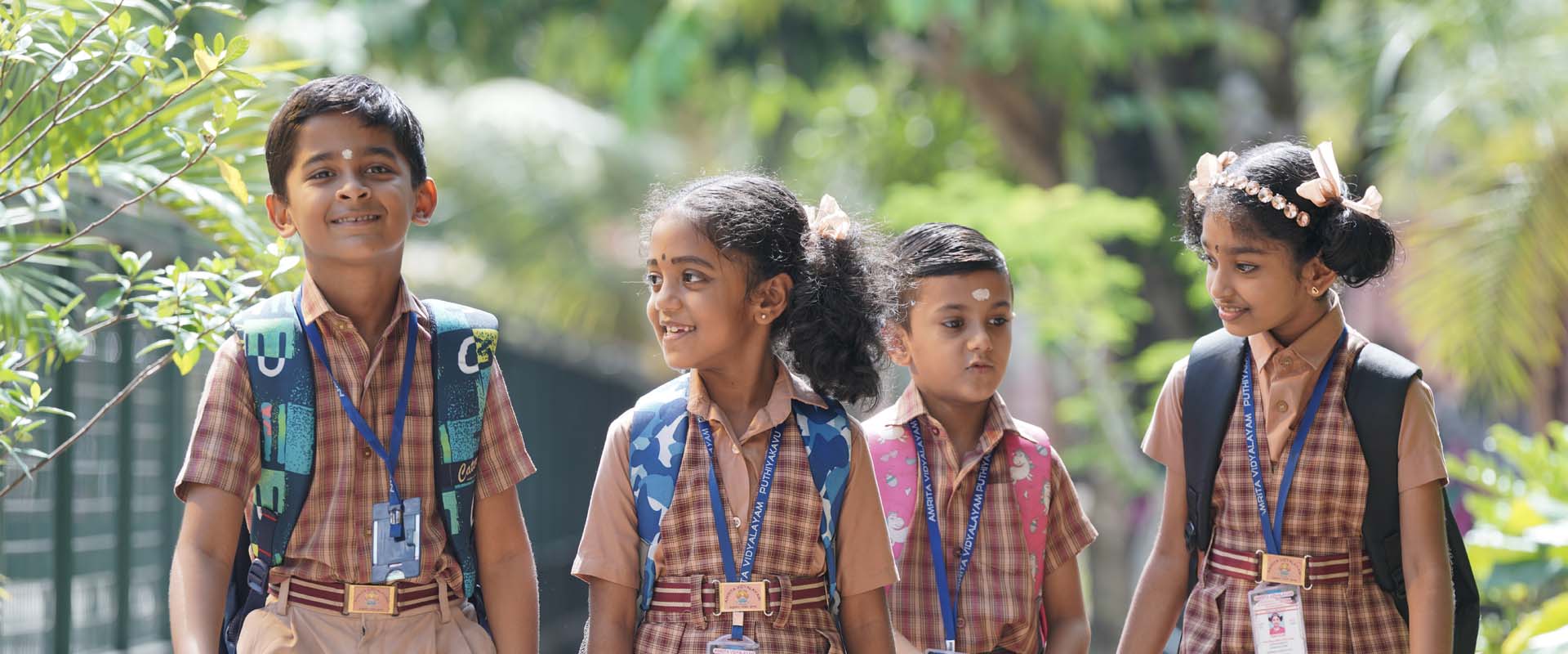 children in school uniforms walking