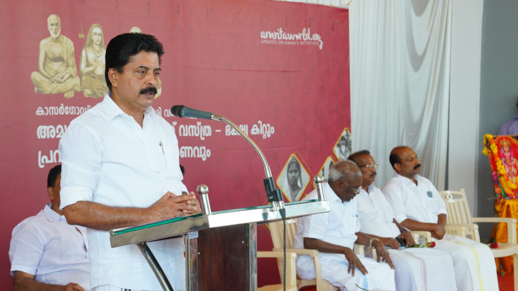 Roshi Augustine, Kerala's Water Resources Minister (CPIM) speaks at the podium.