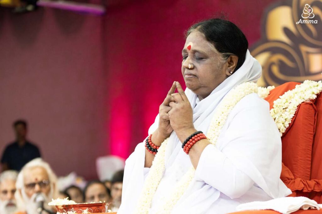 Amma prays