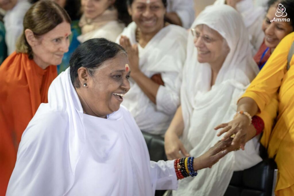 Amma leaving the stage