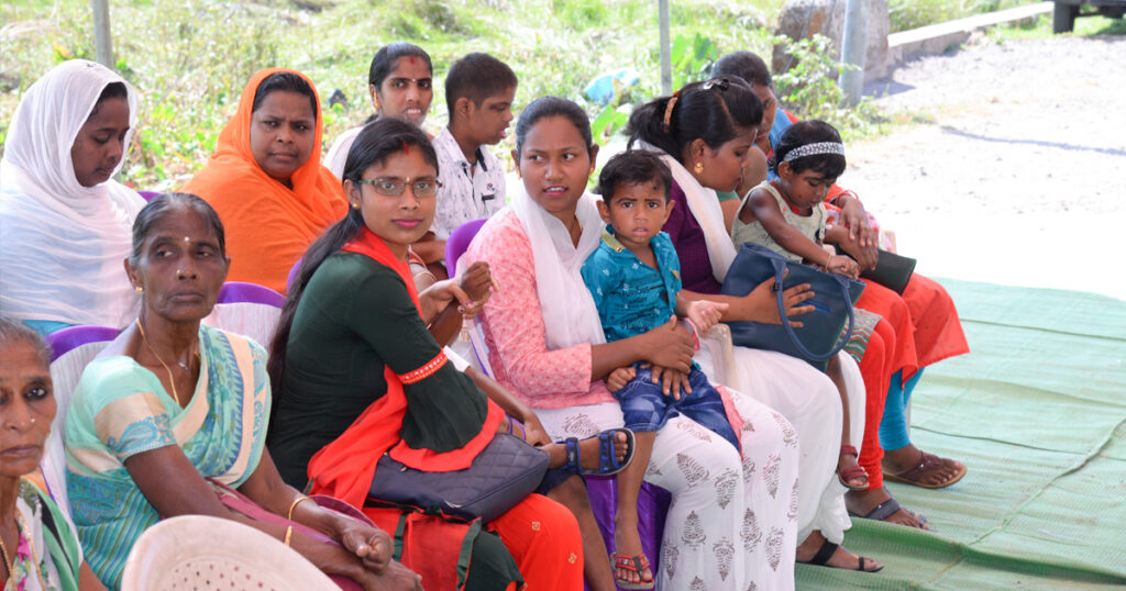 Local residents sit together